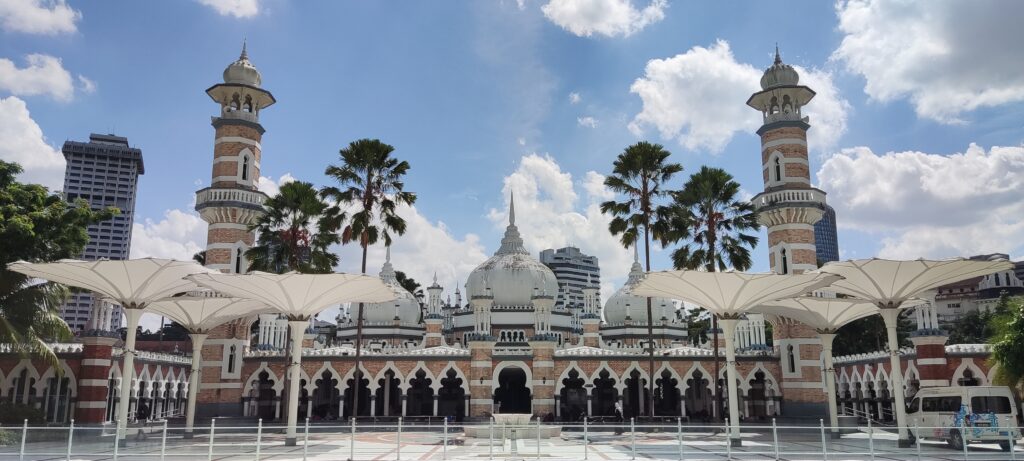 The beautiful Masjid Jamek in Kuala Lumpur, a historic mosque with stunning Moorish and Mughal architecture.